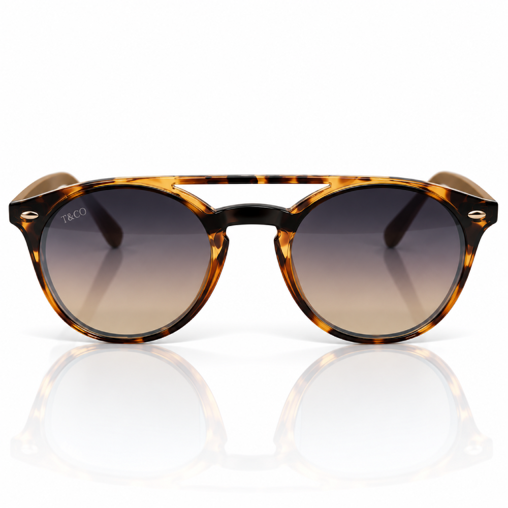 Carey marrón ámbar · lentes verdes · puente superior decorativo